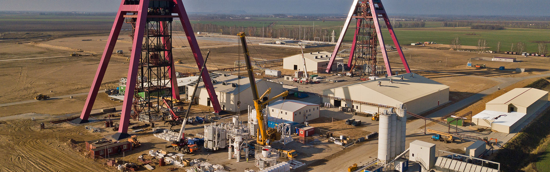 The Nezhinsky Mine shaft involved the development of two 700 m freeze shafts with concrete and steel tubbing liners, and approximately 9,000 m of horizontal excavations. Redpath's patented hydraulic curb ring was successfully introduced on the job.